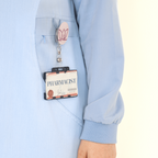 Blue long-top modest medical scrubs designed for Muslim and hijabi healthcare workers.